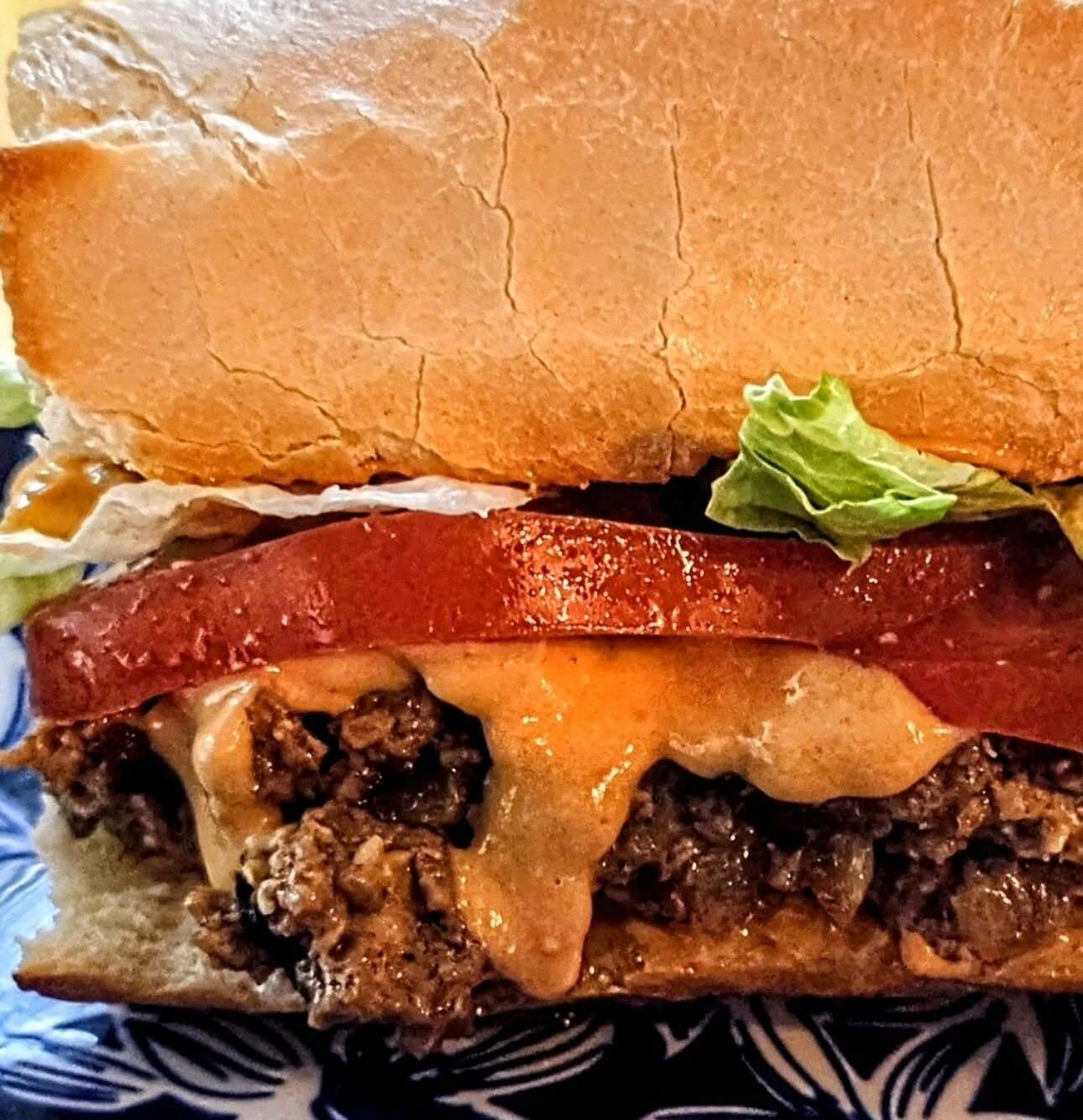 Cheeseburger Smash — smashed beef patty with melted cheese on a brioche bun