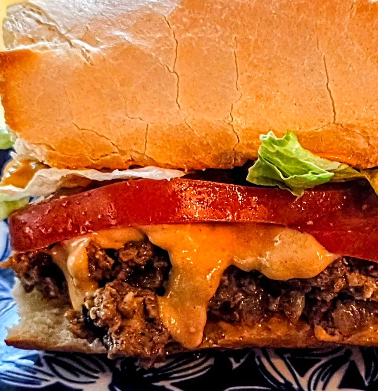Not Yo! Cheese — chopped cheese with house queso on a toasted baguette