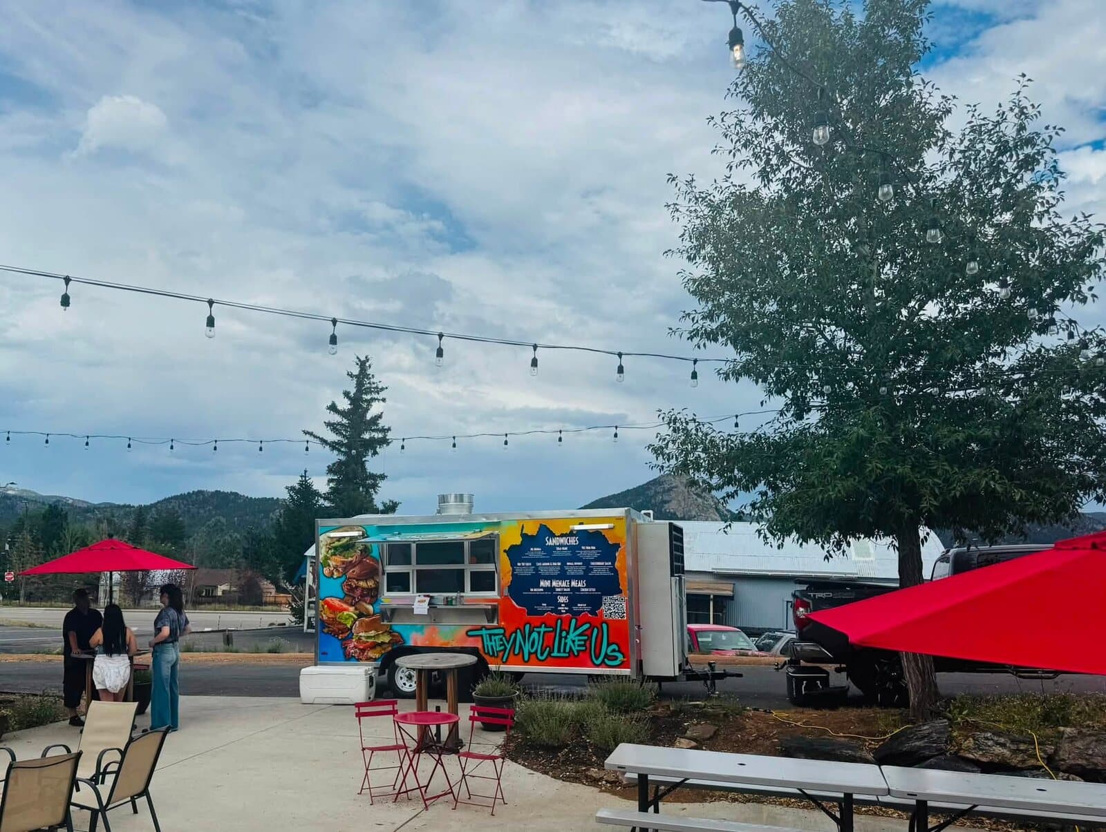 The They Not Like Us food truck set up in a lot
